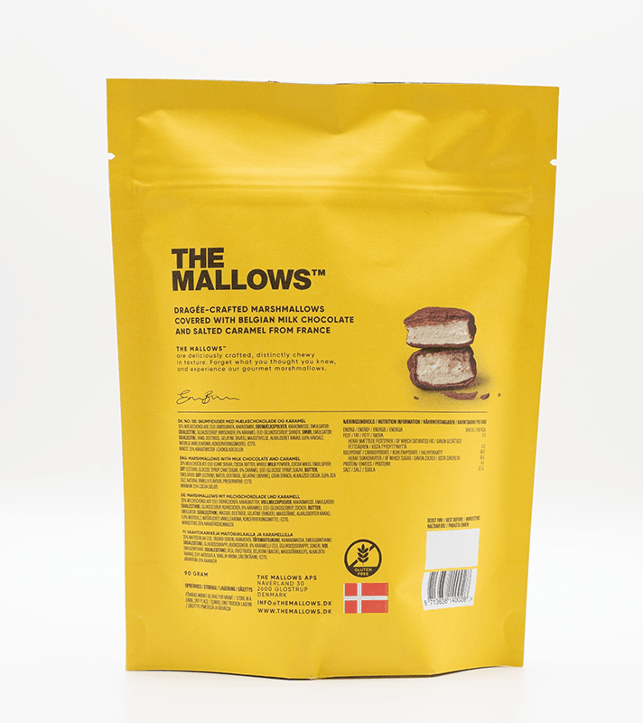 Gelbe Verpackung mit Aufschrift "THE MALLOWS" und Bild eines gefüllten Marshmallow, enthält belgische Milchschokolade und gesalzenen Karamell, glutenfrei, 90 g.