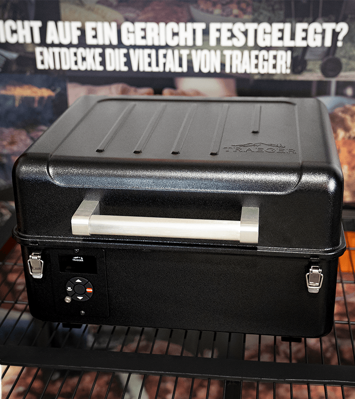 Geschlossener Grillkoffer in schwarz.